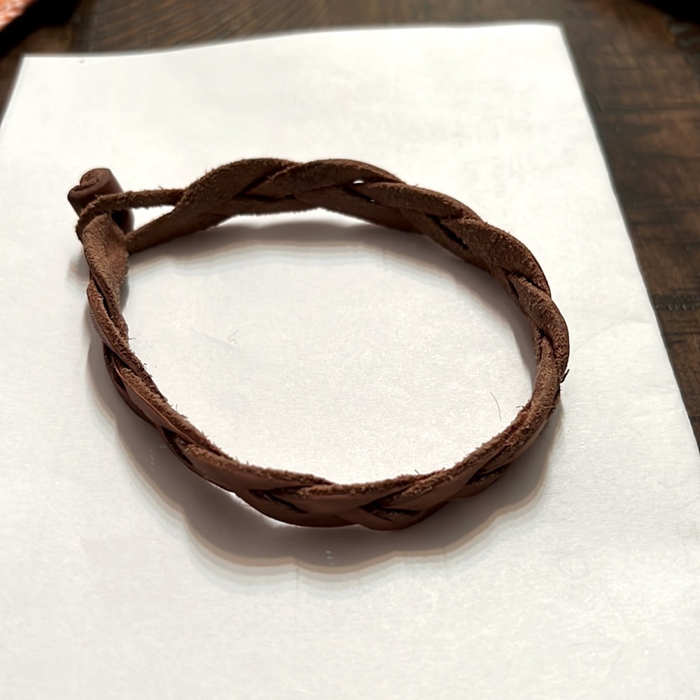 Genuine leather braided bracelet 9 1/2” long. Beautiful Caramel color.